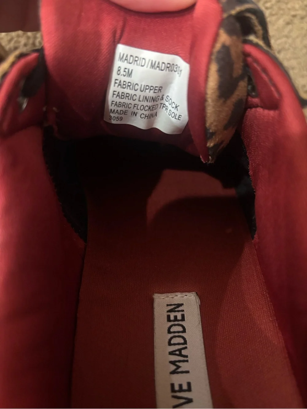 Steve Madden women’s Leopard Print Sneakers with Red Lining